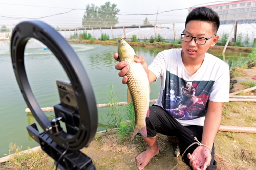 山东阳谷县青年杨广义 返乡创业当鱼头儿 从捕到养巧增收